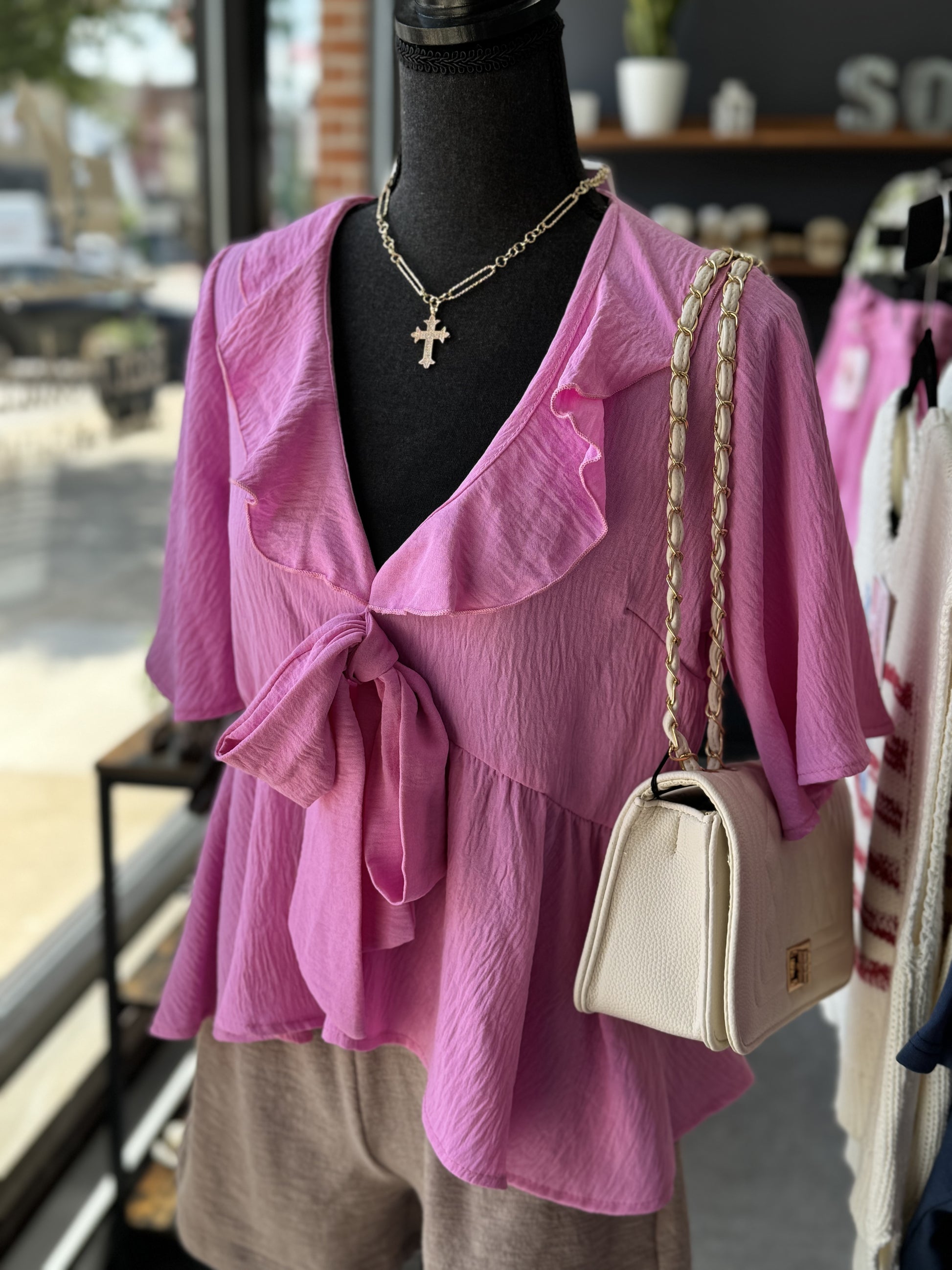 pink blouse that ties