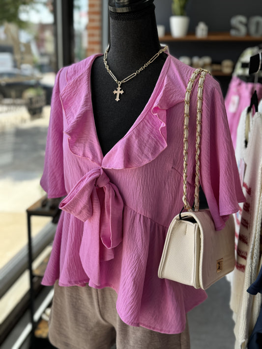 pink blouse that ties