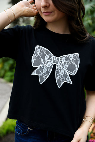 black shirt with white lace bow