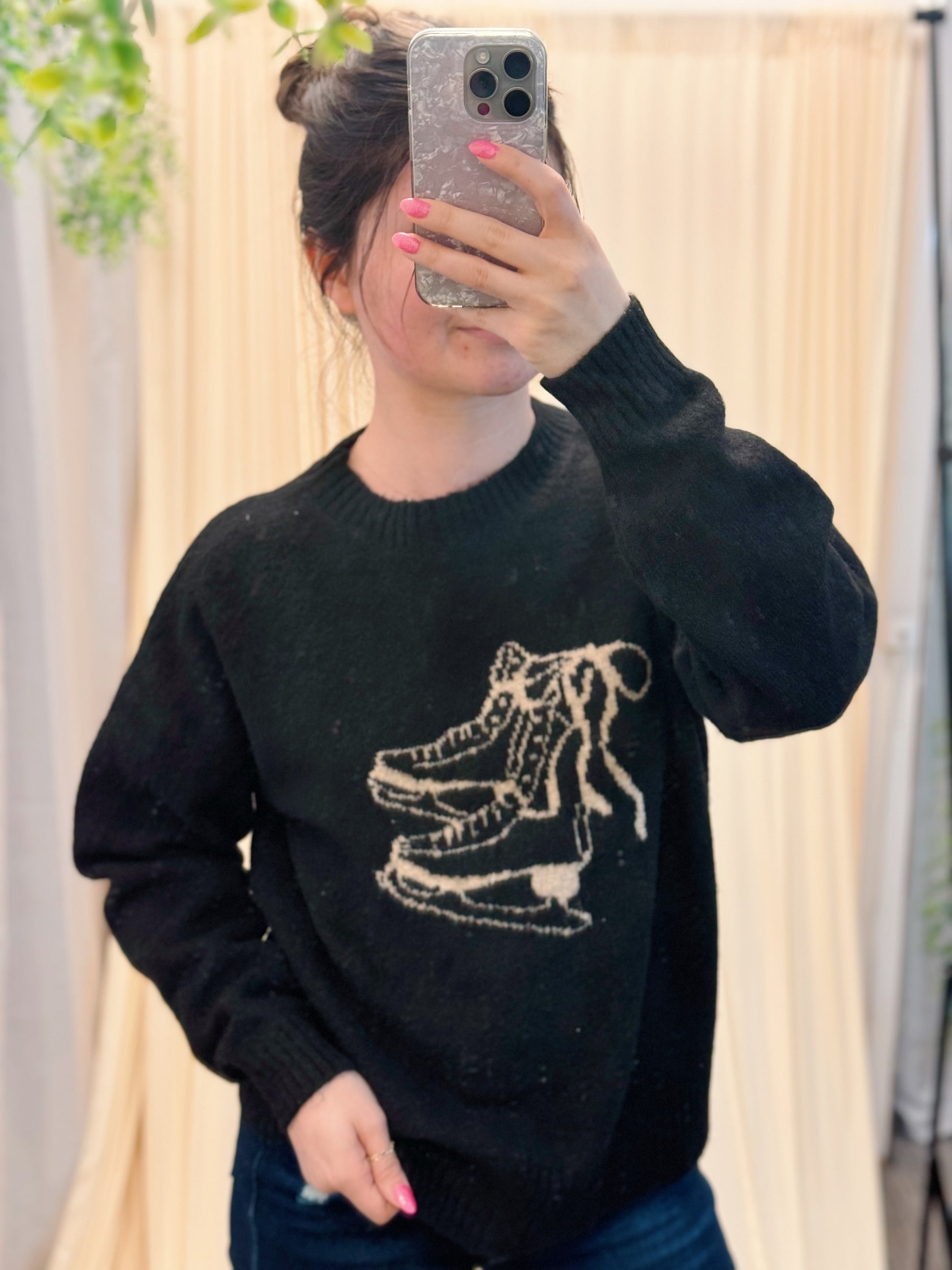 Ice skate black sweater